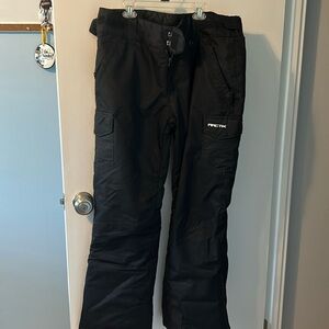 Arctix black snow pants with zipper and Velcro pockets. Regular fix size large